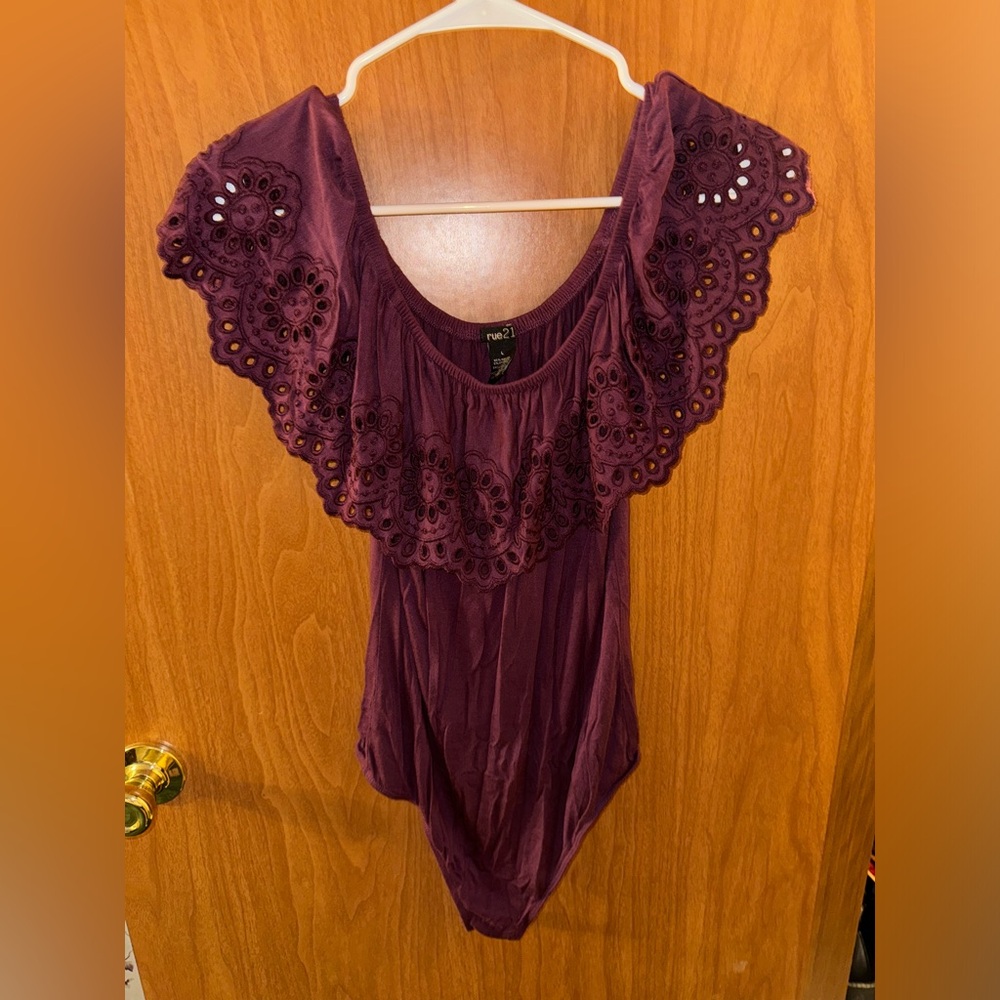 Women’s purple Rue 21 body suit. Size Large.